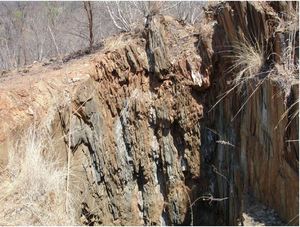 Opencast on sheared country rock with quartz veins Opencast on sheared country rock with quartz veins